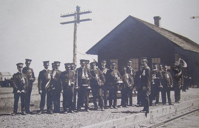 The Minnesota State Band on a railway platform